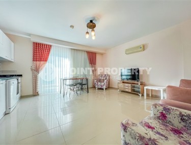 Bright spacious apartment 1+1, total area 65 m2, 100 meters from the beach and promenade-id-4980-photo-1