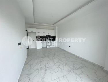 Квартира 1+1 с площадью 52 м2 на этапе завершения отделочных работ, район Оба-id-4351-фото-2