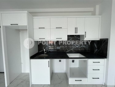 Квартира 1+1 с площадью 52 м2 на этапе завершения отделочных работ, район Оба-id-4351-фото-4