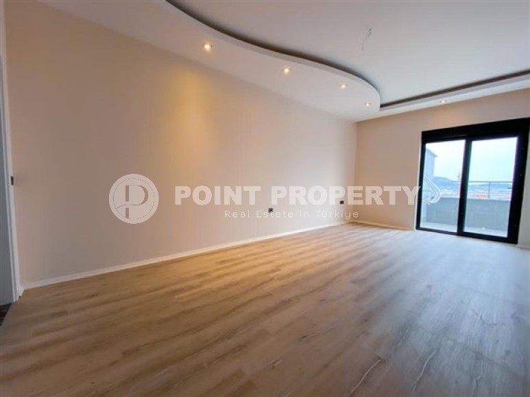 Просторная двухуровневая квартира с чистовой отделкой в 600 метрах от моря, в центре района Махмутлар-id-4993-фото-3