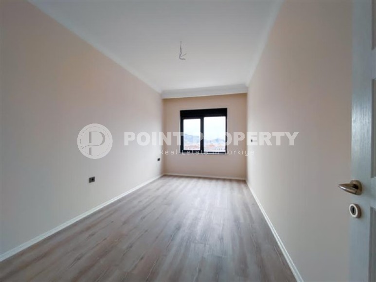 Просторная двухуровневая квартира с чистовой отделкой в 600 метрах от моря, в центре района Махмутлар-id-4993-фото-5