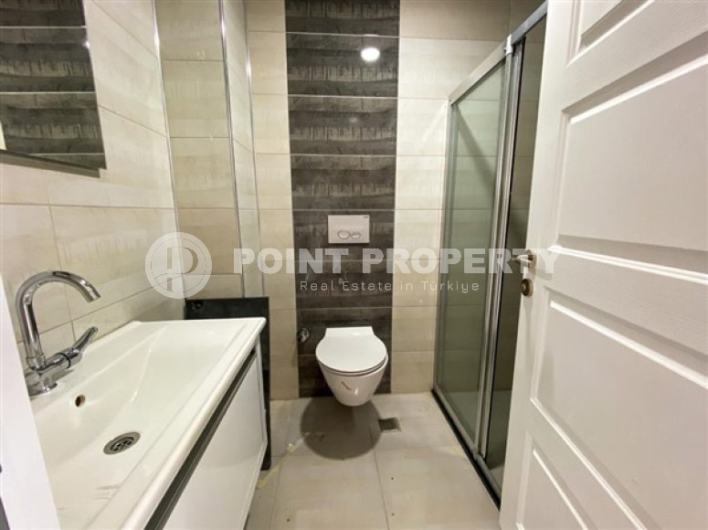 Просторная двухуровневая квартира с чистовой отделкой в 600 метрах от моря, в центре района Махмутлар-id-4993-фото-7