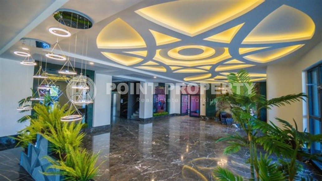 Просторная двухуровневая квартира с чистовой отделкой в 600 метрах от моря, в центре района Махмутлар-id-4993-фото-1