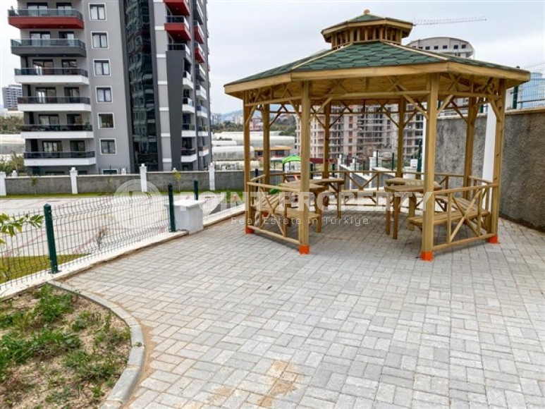 Просторная двухуровневая квартира с чистовой отделкой в 600 метрах от моря, в центре района Махмутлар-id-4993-фото-18