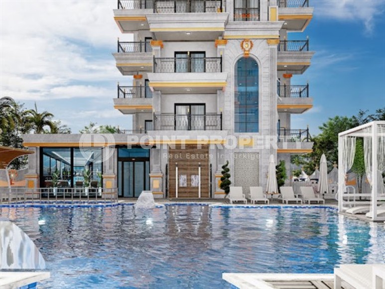 Апартаменты в роскошной резиденции на этапе строительства в популярном районе Аланьи - Махмутлар-id-4998-фото-9