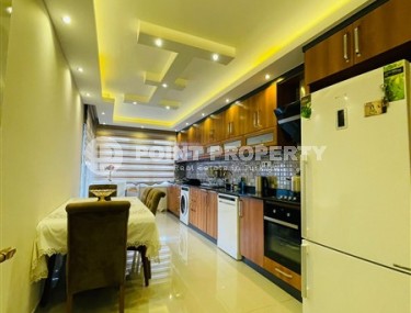 Апартаменты с тремя спальными комнатами, с обстановкой в классическом стиле, в центре города Аланья-id-5002-фото-4