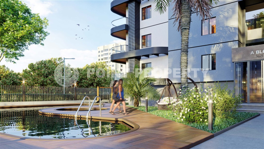 Новый проект резиденции премиум класса, в 650 метрах от моря в Махмутларе для ваших инвестиций-id-1405-фото-12