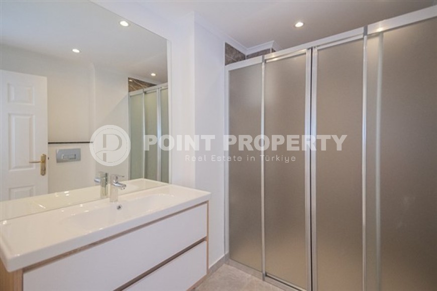 Spacious 4+2 duplex on the 5th floor with an attic on the very beach in the center of Mahmutlar-id-5015-photo-11