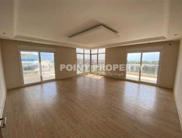 Светлые, большие апартаменты с тремя спальными комнатами, в спальном районе города Аланья- Джикджилли-id-5027-фото-2