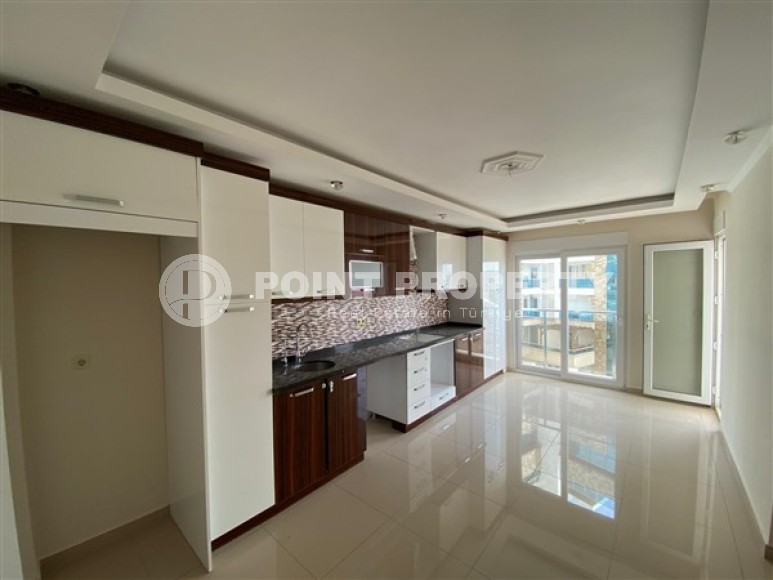 Светлые, большие апартаменты с тремя спальными комнатами, в спальном районе города Аланья- Джикджилли-id-5027-фото-3