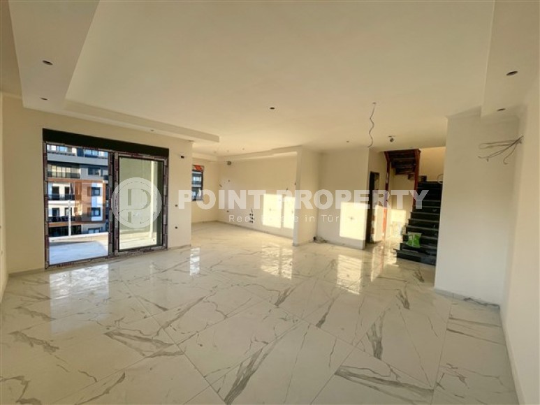 Spacious two-level apartment 2+1, with a total area of 170 m2, on the 4th floor with an attic in the center of Alanya-id-5033-photo-3