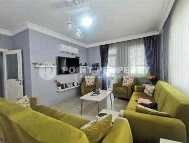 Apartment with two bedrooms and a separate kitchen in the center of Alanya-id-5062-photo-1