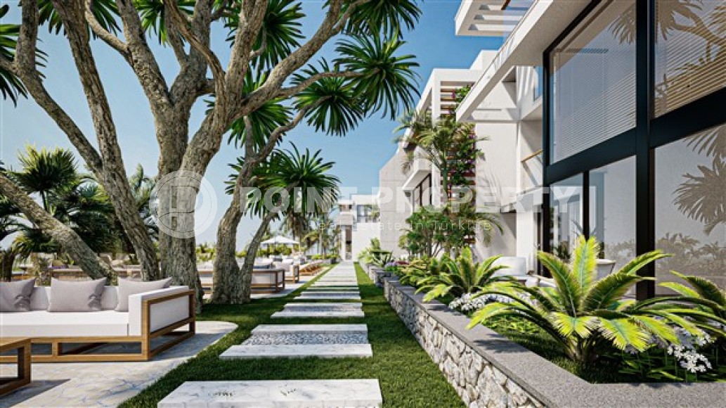 Апартаменты в современном жилом комплексе с инфраструктурой отельного типа, на этапе застройки, в городе Эсентепе - Северный Кипр-id-5067-фото-8