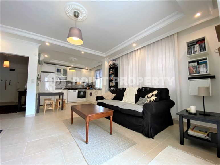 Cozy bright apartment on the 1st floor in a building built in 2009 in the center of Alanya-id-5069-photo-1