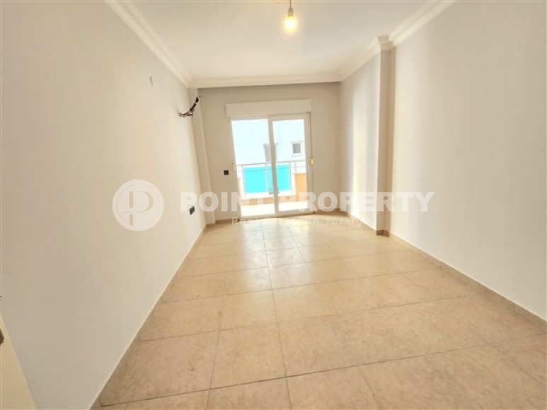 Bright apartment with three bedrooms, unfurnished, in the Mahmutlar area-id-5078-photo-8