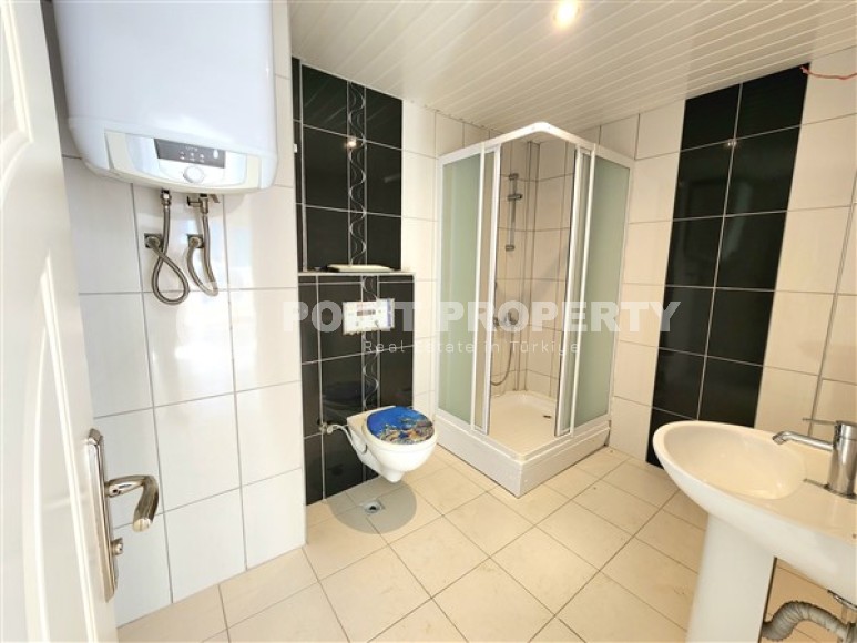 Bright apartment with three bedrooms, unfurnished, in the Mahmutlar area-id-5078-photo-9