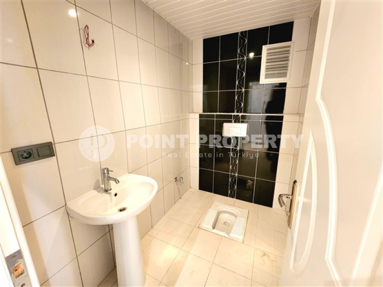 Bright apartment with three bedrooms, unfurnished, in the Mahmutlar area-id-5078-photo-11