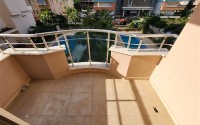 Bright apartment with three bedrooms, unfurnished, in the Mahmutlar area-id-5078-photo-12