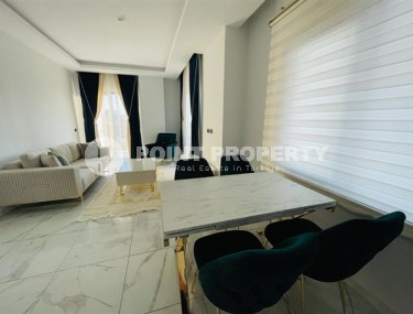 Двухуровневые апартаменты с тремя спальными комнатами в жилом комплексе 2023 года постройки, в районе Махмутлар-id-5079-фото-2