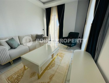 Двухуровневые апартаменты с тремя спальными комнатами в жилом комплексе 2023 года постройки, в районе Махмутлар-id-5079-фото-3