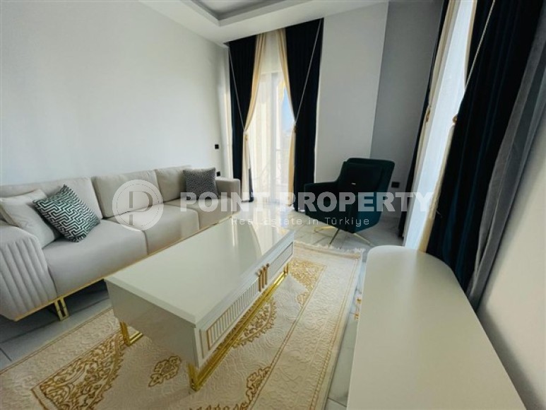 Двухуровневые апартаменты с тремя спальными комнатами в жилом комплексе 2023 года постройки, в районе Махмутлар-id-5079-фото-3