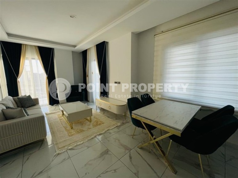 Двухуровневые апартаменты с тремя спальными комнатами в жилом комплексе 2023 года постройки, в районе Махмутлар-id-5079-фото-4