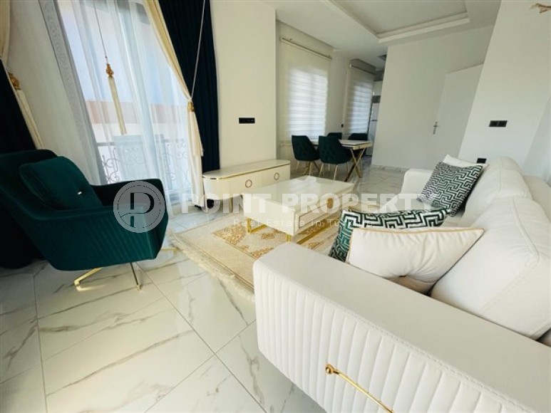 Двухуровневые апартаменты с тремя спальными комнатами в жилом комплексе 2023 года постройки, в районе Махмутлар-id-5079-фото-5