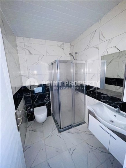 Двухуровневые апартаменты с тремя спальными комнатами в жилом комплексе 2023 года постройки, в районе Махмутлар-id-5079-фото-12