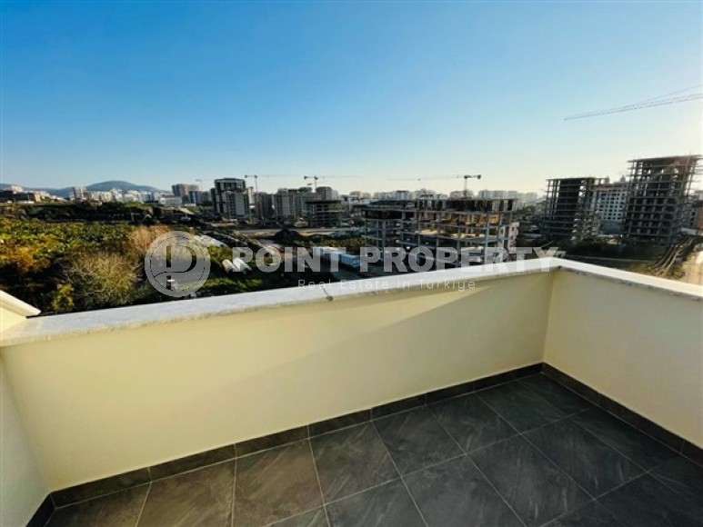 Двухуровневые апартаменты с тремя спальными комнатами в жилом комплексе 2023 года постройки, в районе Махмутлар-id-5079-фото-14