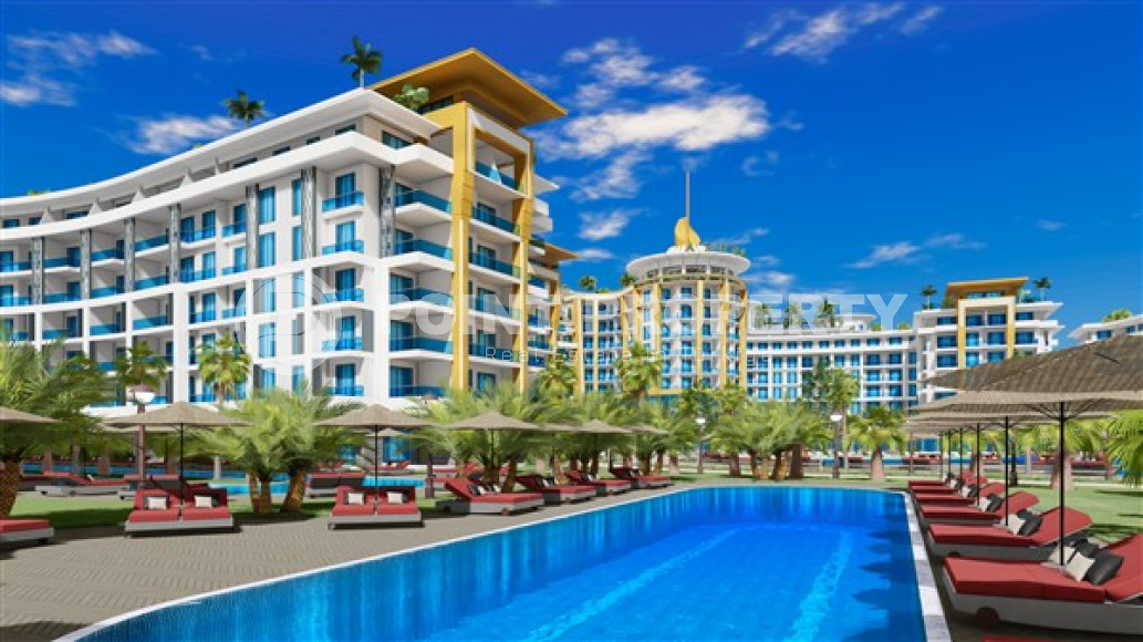 Cozy apartments, spacious townhouses and luxury villas in a new premium complex under construction in the Turkler area, 300 meters from the sea.-id-1054-photo-1