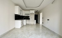 One-bedroom apartment in fine finishing, near the sea, in the Mahmutlar area-id-5093-photo-2