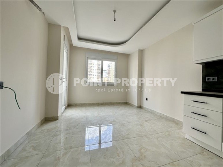 One-bedroom apartment in fine finishing, near the sea, in the Mahmutlar area-id-5093-photo-3