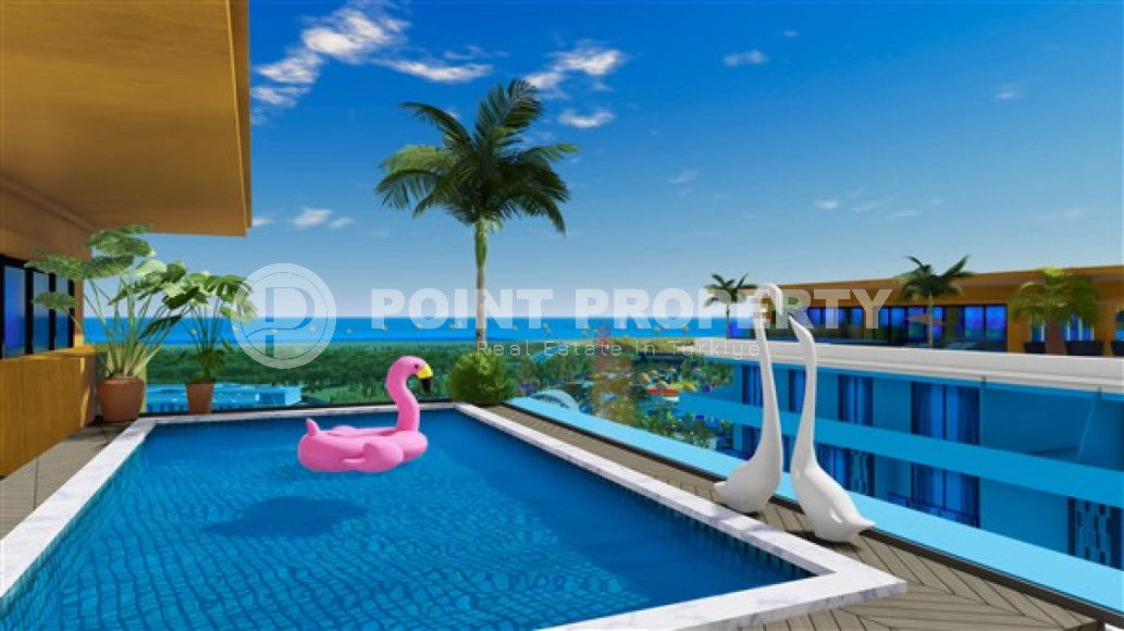 Cozy apartments, spacious townhouses and luxury villas in a new premium complex under construction in the Turkler area, 300 meters from the sea.-id-1054-photo-2
