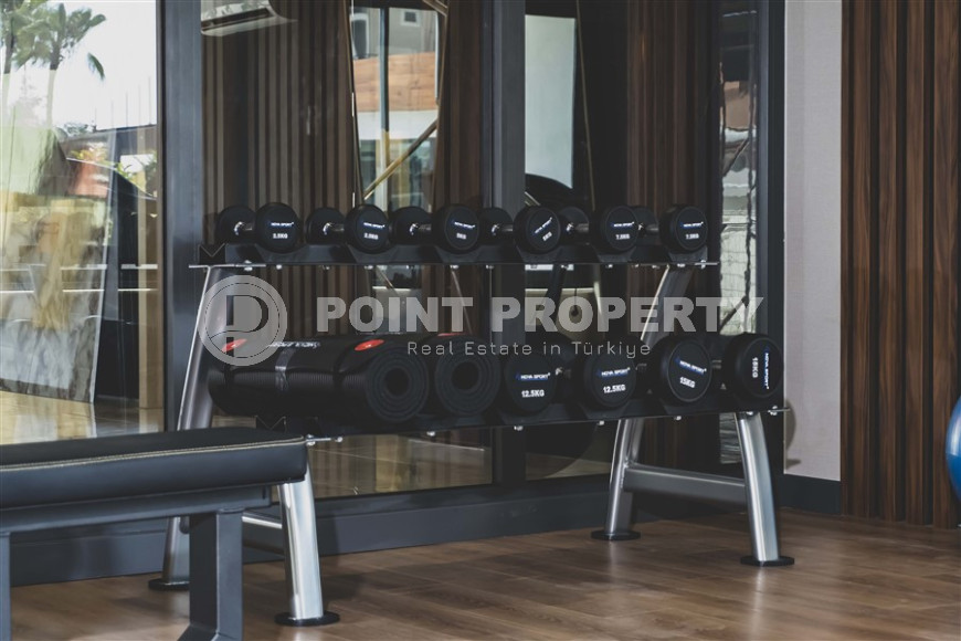 Квартира 1+1, 67м², в элитном комплексе на первой береговой линии в Махмутларе, Алания-id-1410-фото-18