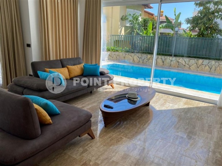 Well-maintained villa with three bedrooms, a fenced area with a garden and a swimming pool, in the center of Alanya-id-5097-photo-1