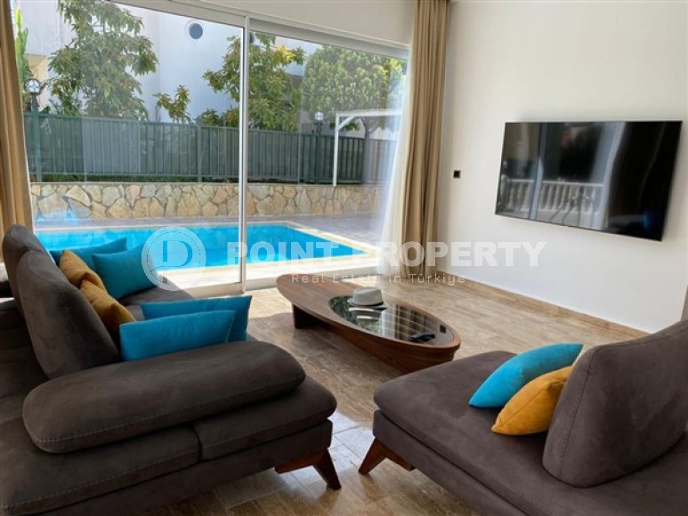Well-maintained villa with three bedrooms, a fenced area with a garden and a swimming pool, in the center of Alanya-id-5097-photo-6