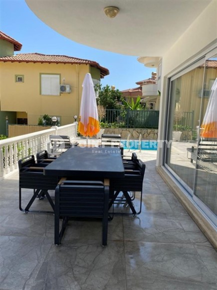 Well-maintained villa with three bedrooms, a fenced area with a garden and a swimming pool, in the center of Alanya-id-5097-photo-15