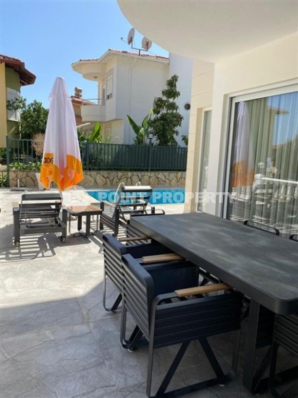 Well-maintained villa with three bedrooms, a fenced area with a garden and a swimming pool, in the center of Alanya-id-5097-photo-16