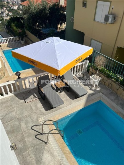 Well-maintained villa with three bedrooms, a fenced area with a garden and a swimming pool, in the center of Alanya-id-5097-photo-20