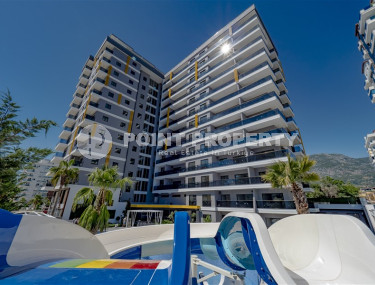 New luxury residence with hotel infrastructure 150 meters from the sea in Mahmutlar-id-1411-photo-1