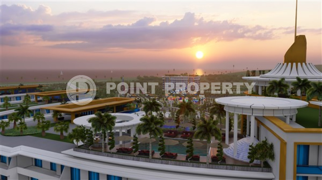 Уютные апартаменты, просторные таунхаусы и шикарные виллы в новом строящемся комплексе премиум-класса в районе Тюрклер в 300 метрах от моря.-id-1054-фото-5