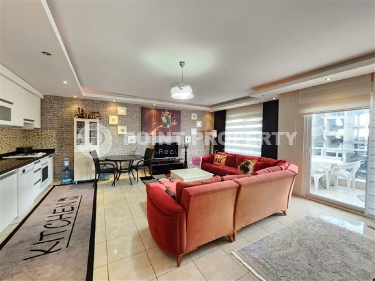 Large furnished apartment 1+1, with a total area of 90 m2, 200 meters from the sea in the center of Mahmutlar-id-5114-photo-2