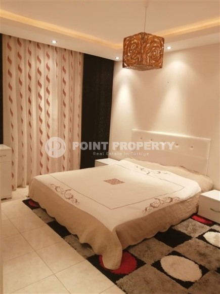 Large furnished apartment 1+1, with a total area of 90 m2, 200 meters from the sea in the center of Mahmutlar-id-5114-photo-3