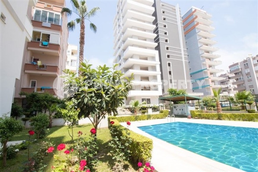 Large furnished apartment 1+1, with a total area of 90 m2, 200 meters from the sea in the center of Mahmutlar-id-5114-photo-6