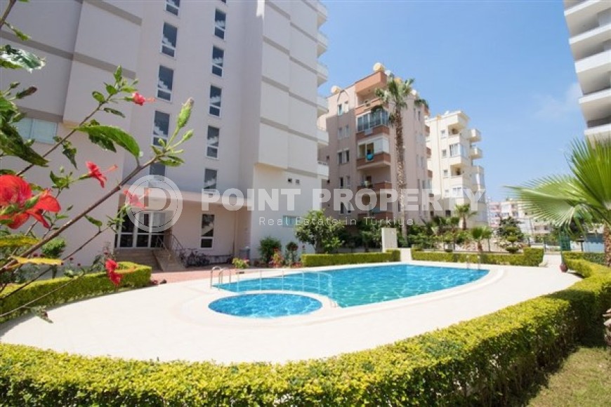 Large furnished apartment 1+1, with a total area of 90 m2, 200 meters from the sea in the center of Mahmutlar-id-5114-photo-7