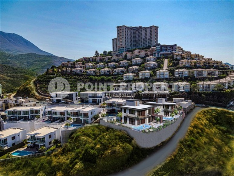 Роскошная трехэтажная вилла 4+1 с инфинити бассейном в престижном районе Аланьи - Каргыджак-id-5115-фото-15