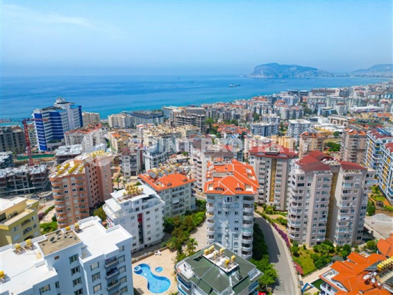 Большие светлые апартаменты с двумя спальными комнатами и видом на Средиземное море, в районе Тосмур-id-5124-фото-13