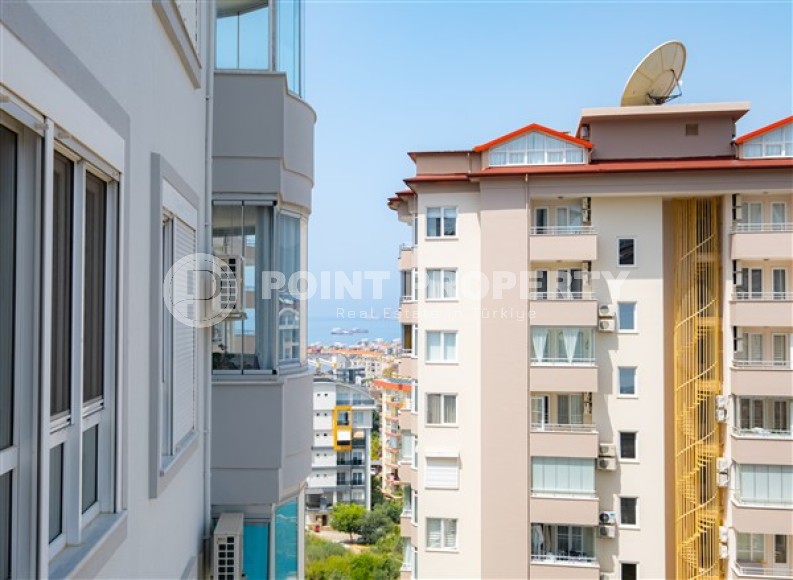 Большие светлые апартаменты с двумя спальными комнатами и видом на Средиземное море, в районе Тосмур-id-5124-фото-16