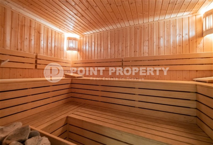 Большие светлые апартаменты с двумя спальными комнатами и видом на Средиземное море, в районе Тосмур-id-5124-фото-17