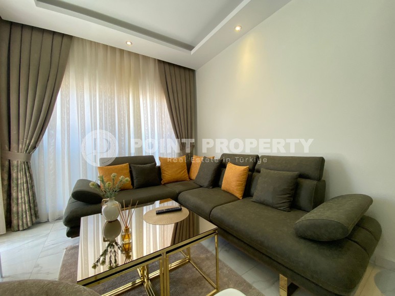 Apartment 1+1 for rent in a new complex, located in the Kestel area, 300 meters from the sea-id-5127-photo-1